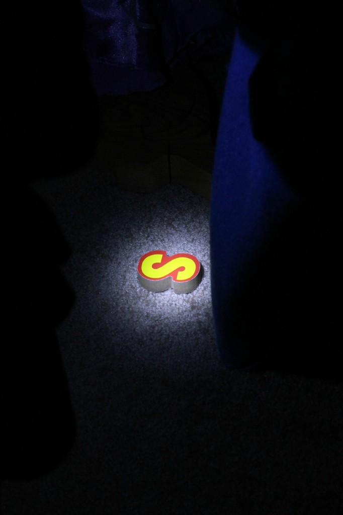 Flashlight Alphabet Game found the letter S from Happilyevermom
