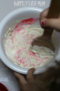 Mixing Erupting Cupcakes from Happilyevermom