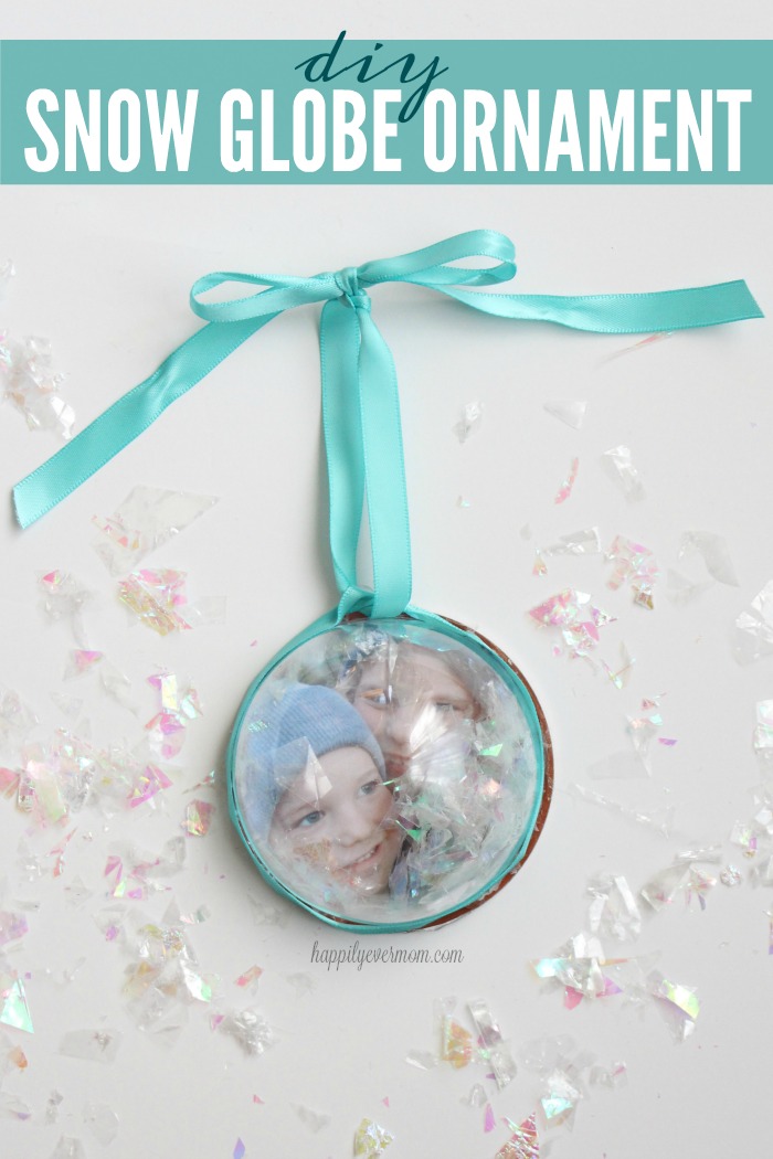 This is TOO cute and so simple to make. I love the idea of making a snow globe ornament with a picture of my kids. I'm kind of obsessed with making ornaments, so this diy snow globe ornament is going to be front and center on my tree!
